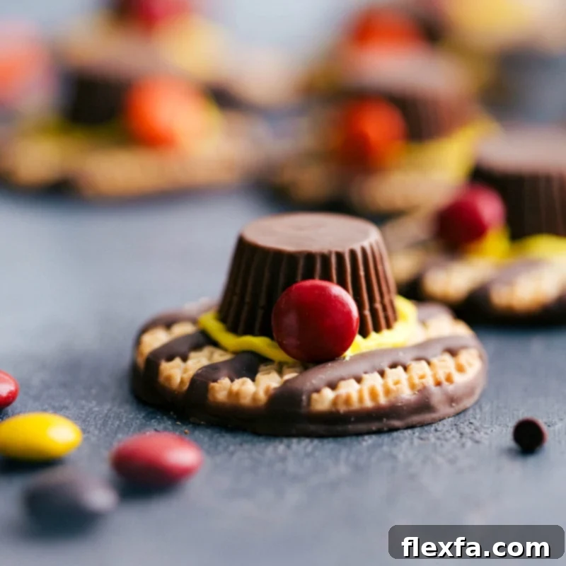 Creative pilgrim hats crafted from cookies and candy, a playful addition for your Thanksgiving menu ideas, adding a touch of whimsy.