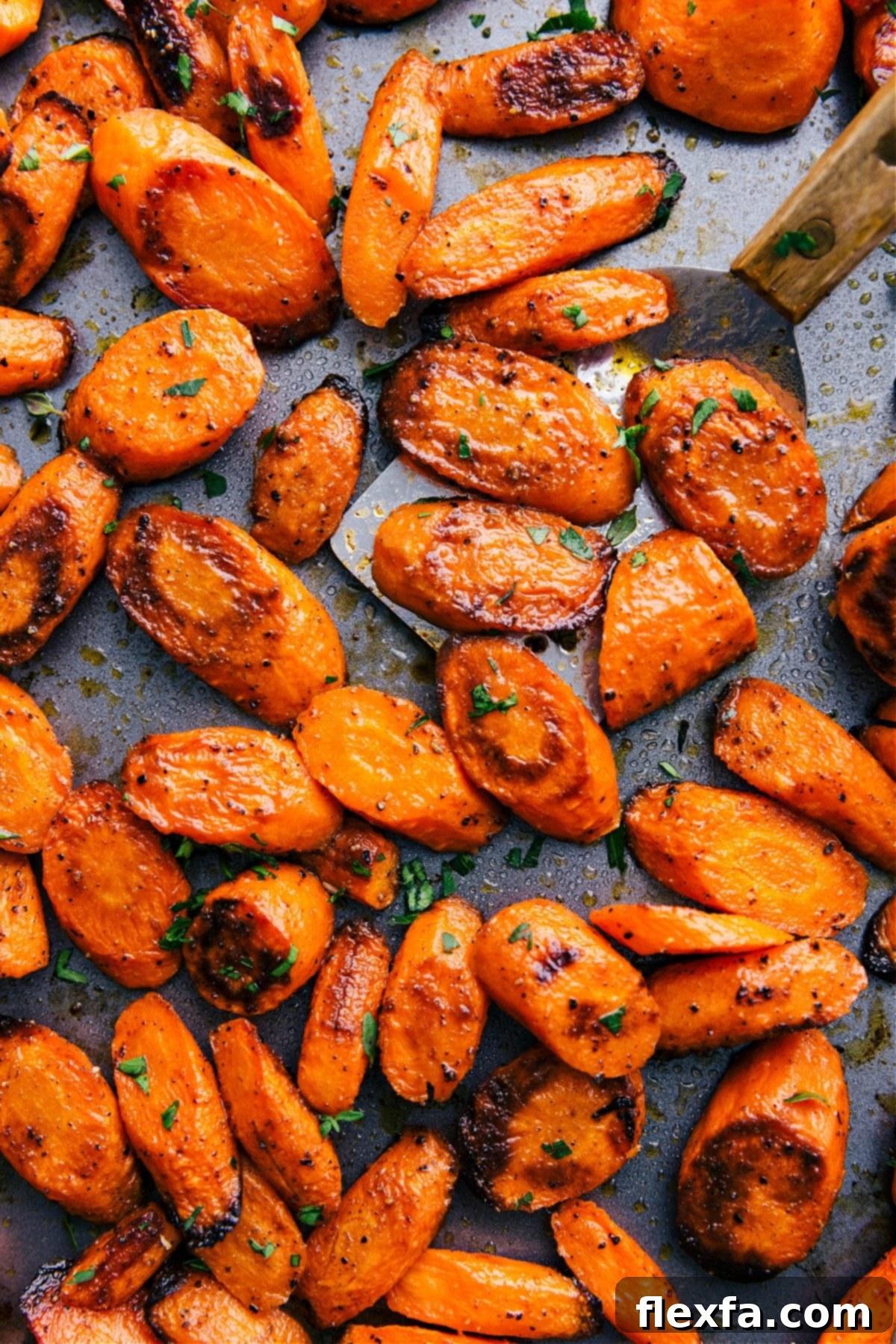 The Best And Easiest Roasted Carrots Recipe for Any Occasion A tray of perfectly roasted carrots, golden and slightly caramelized, ready to be served as a delicious side dish.