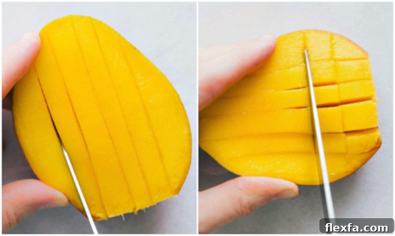 The remaining narrow sides of a mango are being sliced to remove additional fruit after the main cheeks have been cut, often considered a cook's treat.