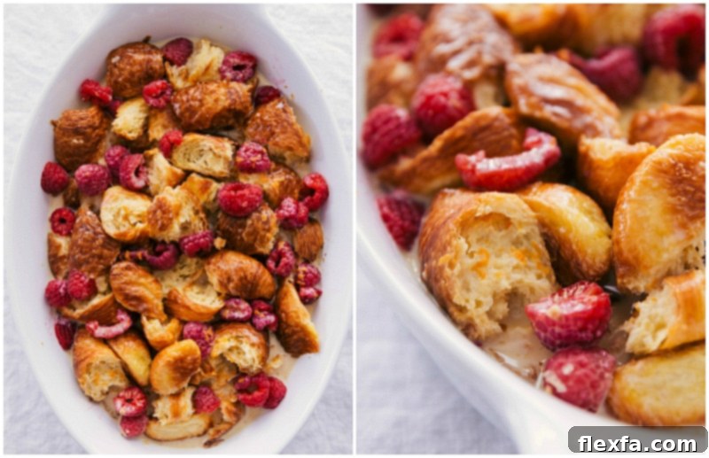 An unbaked easy bread pudding recipe, featuring golden croissant pieces and vibrant raspberries soaking in a creamy custard, nestled beautifully in a baking dish and ready for the oven. This delightful breakfast casserole promises a delicious start to any day, showcasing careful preparation.