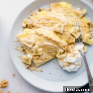 A stack of beautifully golden Banana Crepes, ready to be filled and enjoyed.