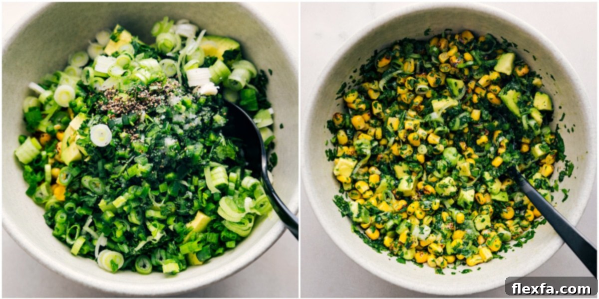 The vibrant Mexican street corn topping mixed together in a bowl, featuring corn, avocado, cilantro, green onions, and jalapeño.