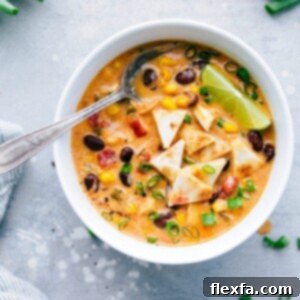 Fiesta Chicken Quesadilla Soup 4 A delicious and creamy slow cooker chicken quesadilla soup with quesadilla croutons.