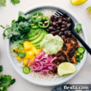 Close-up of a Chicken Rice Bowl with avocado sauce