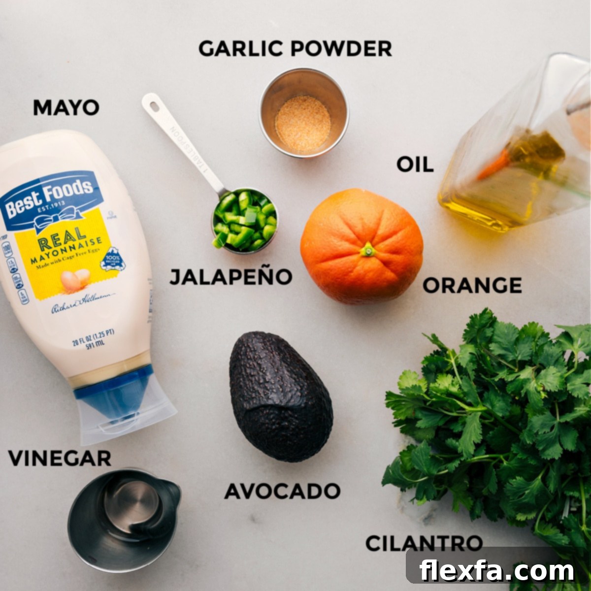 All the fresh ingredients for the creamy avocado sauce, laid out for easy assembly.