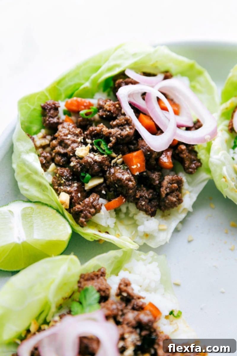 Finished Beef Lettuce Wraps with Fresh Toppings The finished beef lettuce wraps, beautifully presented with fresh toppings and packed with delicious, savory flavor, ready to be enjoyed.