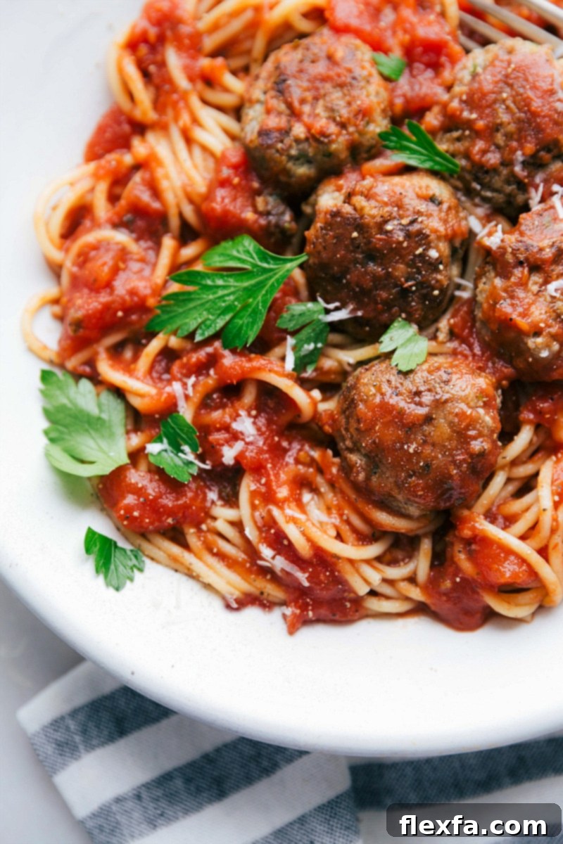 Tender Ground Turkey Meatballs with Al Dente Pasta and Rich Red Sauce, Ready to Be Enjoyed