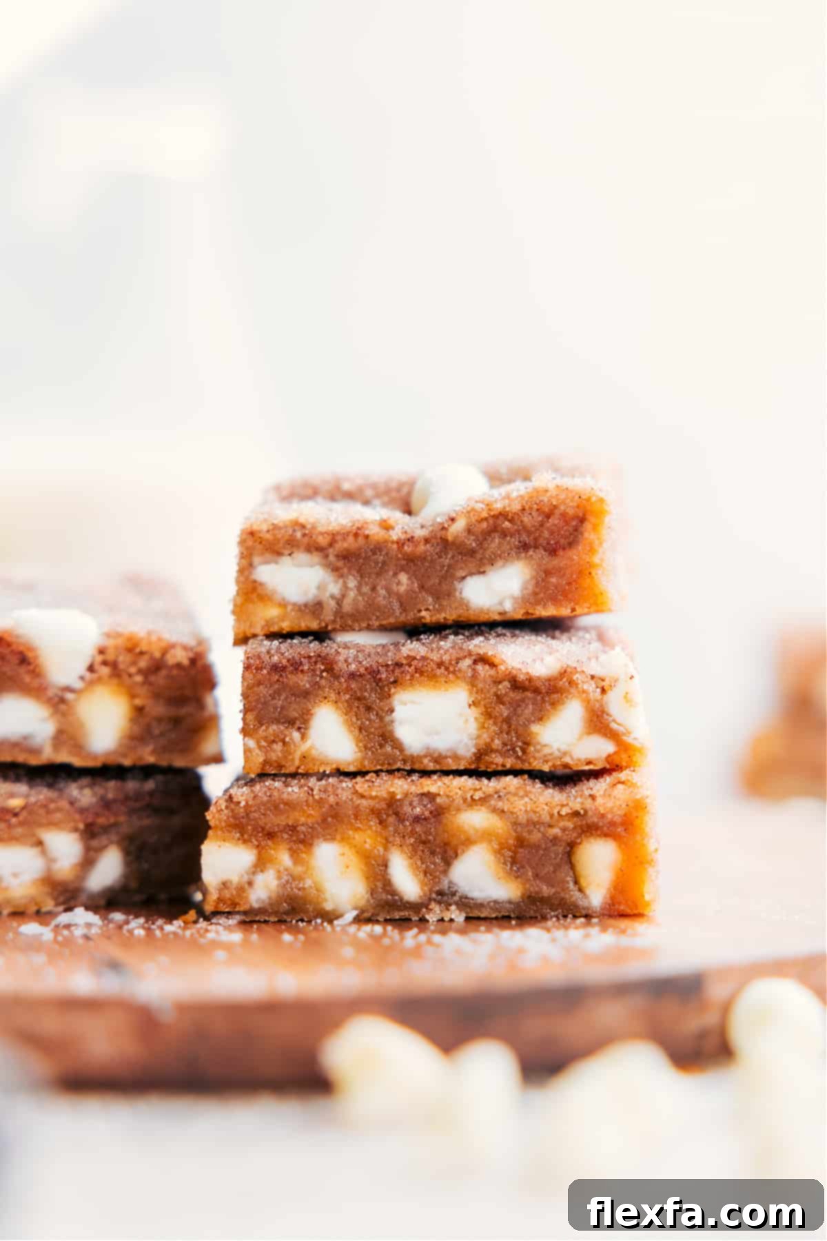 The best Snickerdoodle Blondies stacked on top of each other ready to be enjoyed.