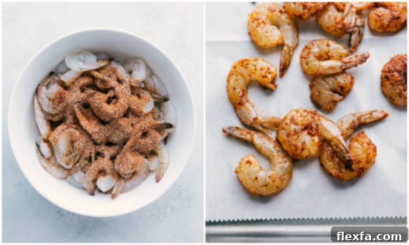 Raw medium shrimp, peeled and deveined, seasoned generously with a spice mix and arranged on a sheet pan, ready for the oven to transform into delicious fajitas.