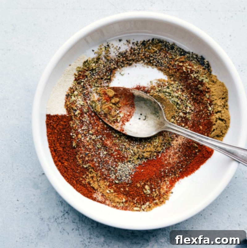 All the seasonings in a bowl, ready to be mixed together to add rich flavor to the recipe.