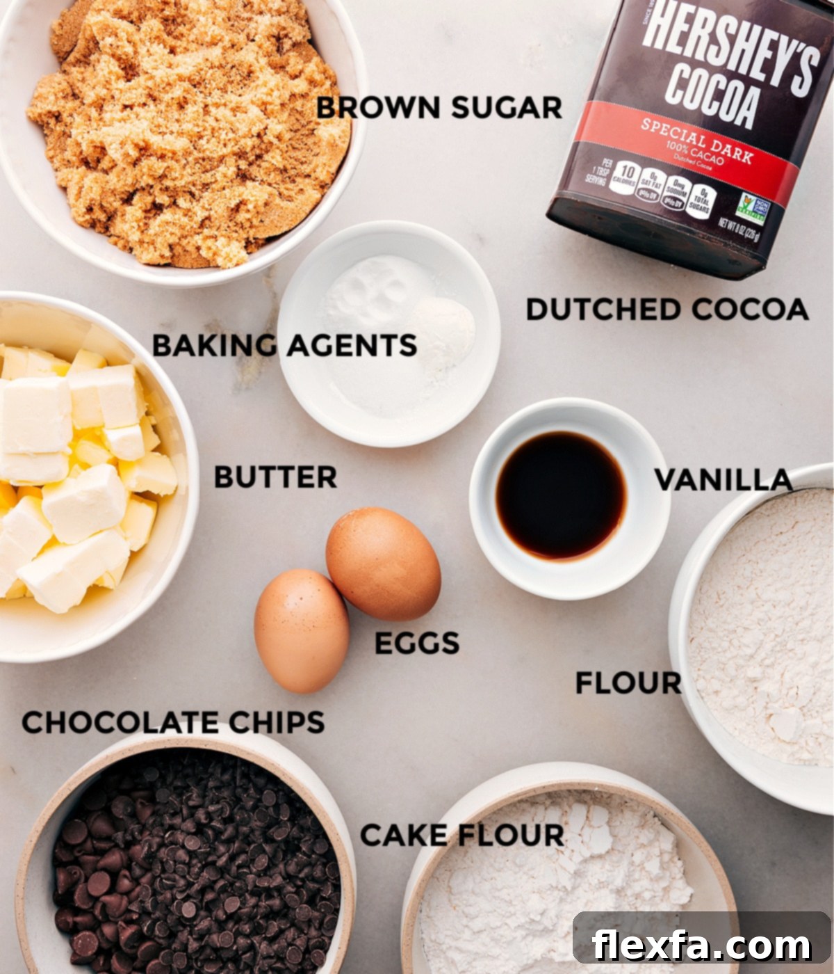 An array of fresh ingredients for chocolate cookies, perfectly laid out and ready for baking.