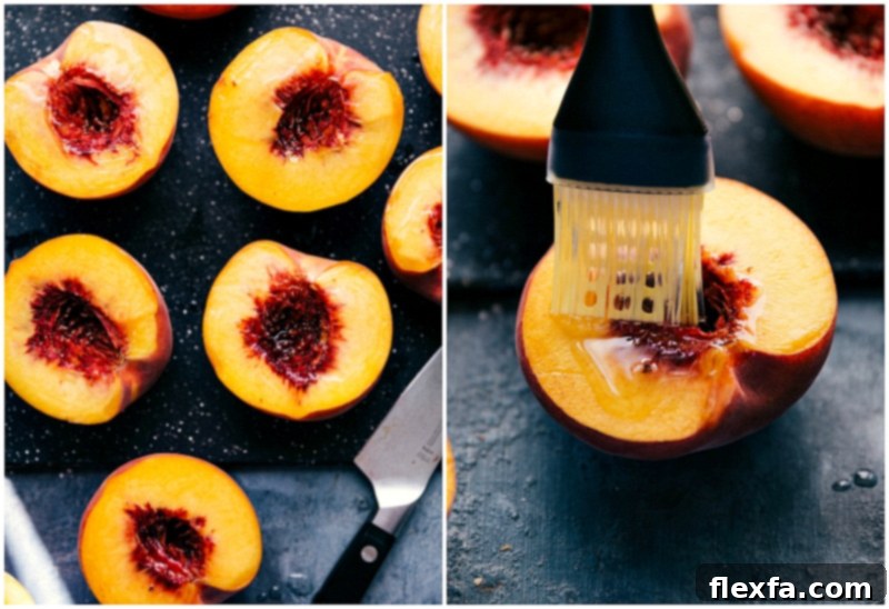 Olive oil being delicately brushed onto the cut sides of fresh peach halves, a crucial step for preparing the fruit for grilling, ensuring a beautiful char and preventing sticking.
