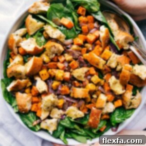 Roasted veggie salad in a giant bowl, delicious and filling, ready to be served.