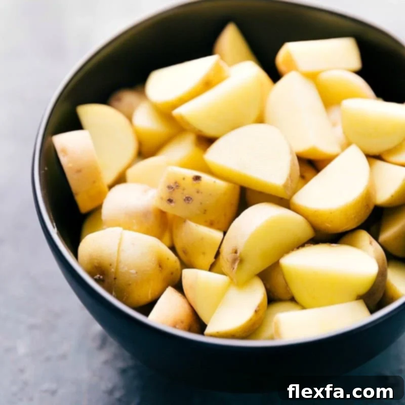 Perfectly prepared and diced baby gold potatoes, ready to be added to the rich curry sauce.