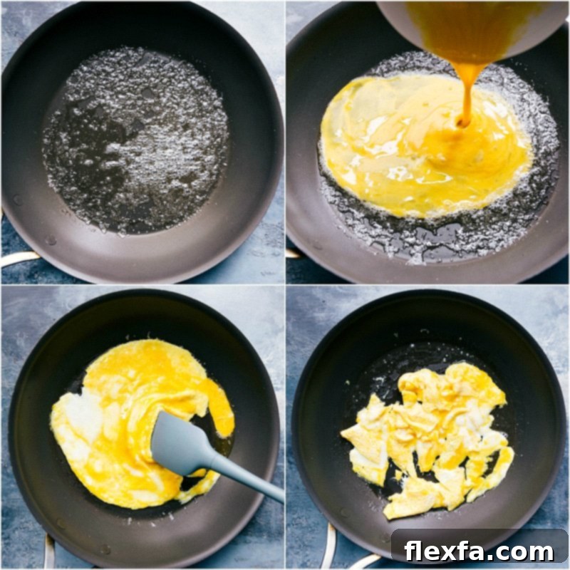 Close-up view of eggs sizzling and scrambling in a hot pan, preparing to be added to the Quinoa Fried Rice.