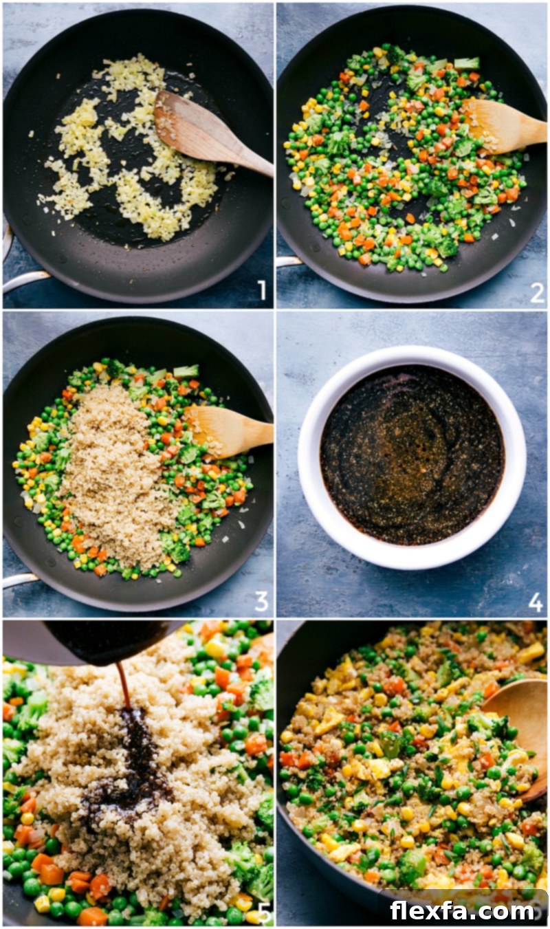 A large pan showing various vegetables, cooked quinoa, and savory sauce being stir-fried together for the Quinoa Fried Rice recipe.