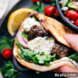 Close-up image of a perfectly cooked Greek Meatball (Keftede) with a crispy exterior, ready to be served.