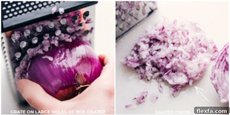 Process shot of a vibrant red onion being carefully grated on a box grater, demonstrating a key preliminary step in preparing the Greek Meatballs mixture.