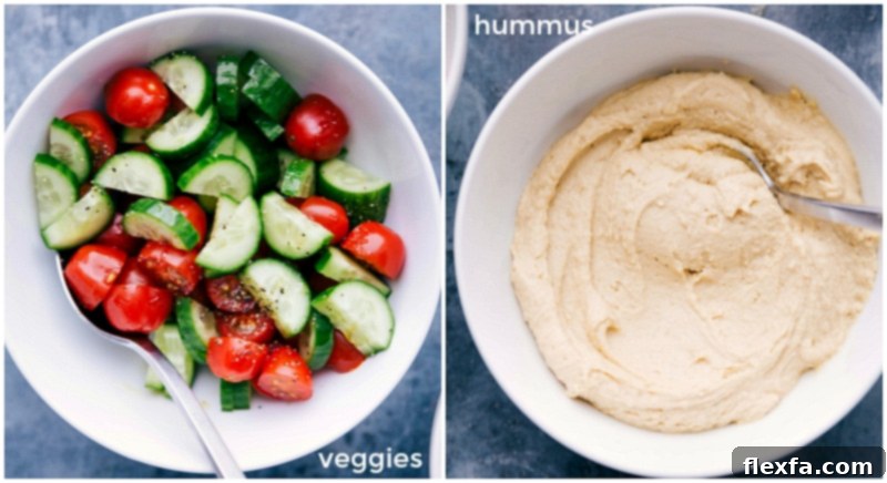 Assortment of fresh vegetables and bowl of hummus served on the side.