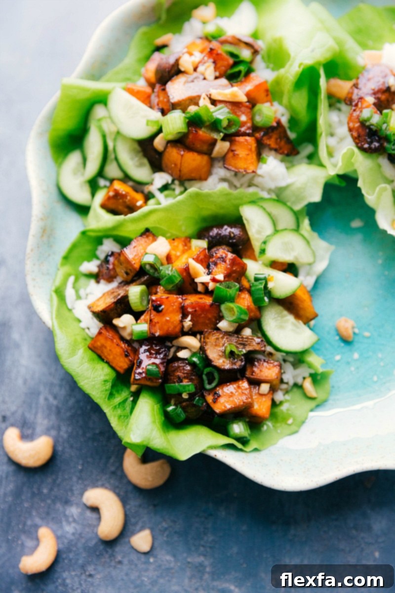 Delicious Vegetarian Lettuce Wraps, Ready for Enjoyment Vegetarian lettuce wraps filled with a medley of fresh ingredients, ready to be savored. A healthy and delicious plant-based meal.