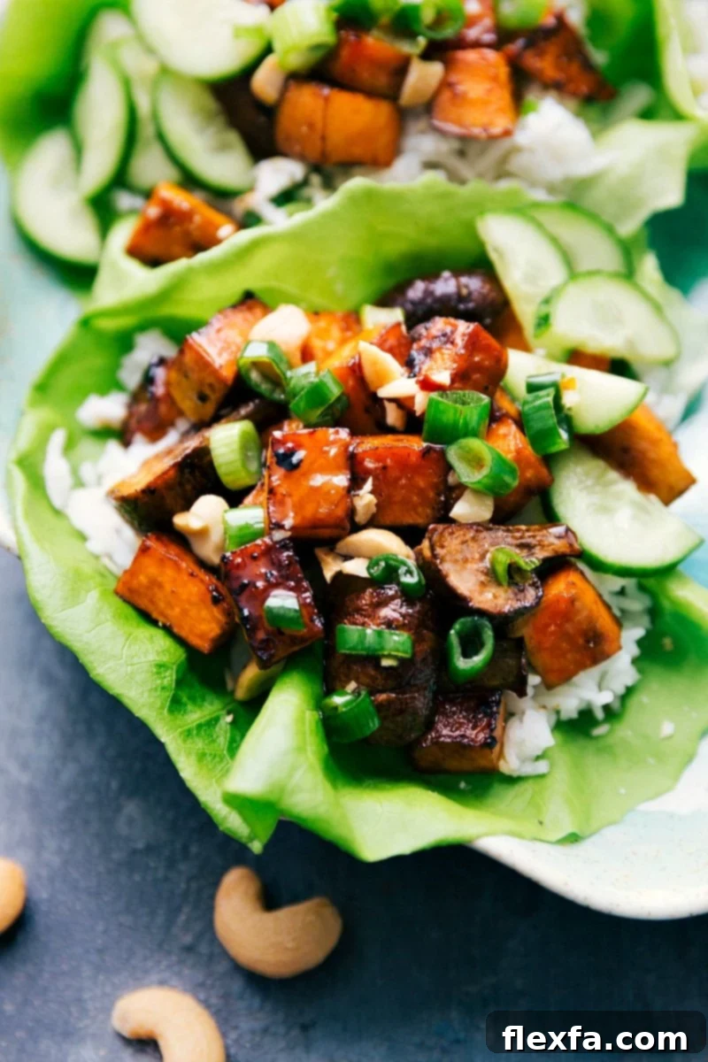 Ready-to-Eat Healthy Vegetarian Lettuce Wrap A delectable and healthy vegetarian lettuce wrap, perfectly assembled and ready to be enjoyed. Highlighted by fresh ingredients.