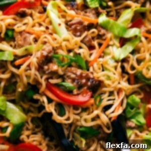 Savory egg roll in a bowl with ramen noodles, a delectable dish.