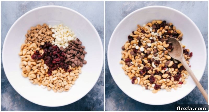 Ingredients for the indulgent trail mix recipe including white and milk chocolate chips, peanut butter baking chips, dried cranberries, peanuts, and cashews, being stirred together.