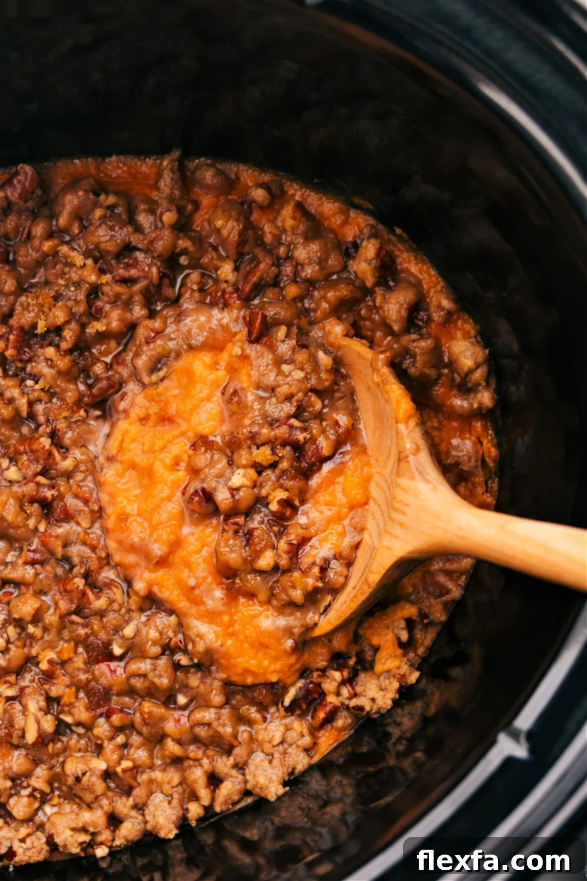 Perfectly Cooked Crockpot Sweet Potato Casserole Crockpot Sweet Potato Casserole is ready to serve straight from the slow cooker, garnished with fresh herbs.