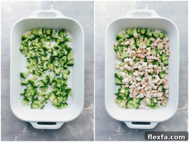 Broccoli and meat being layered into a casserole dish for cooking.
