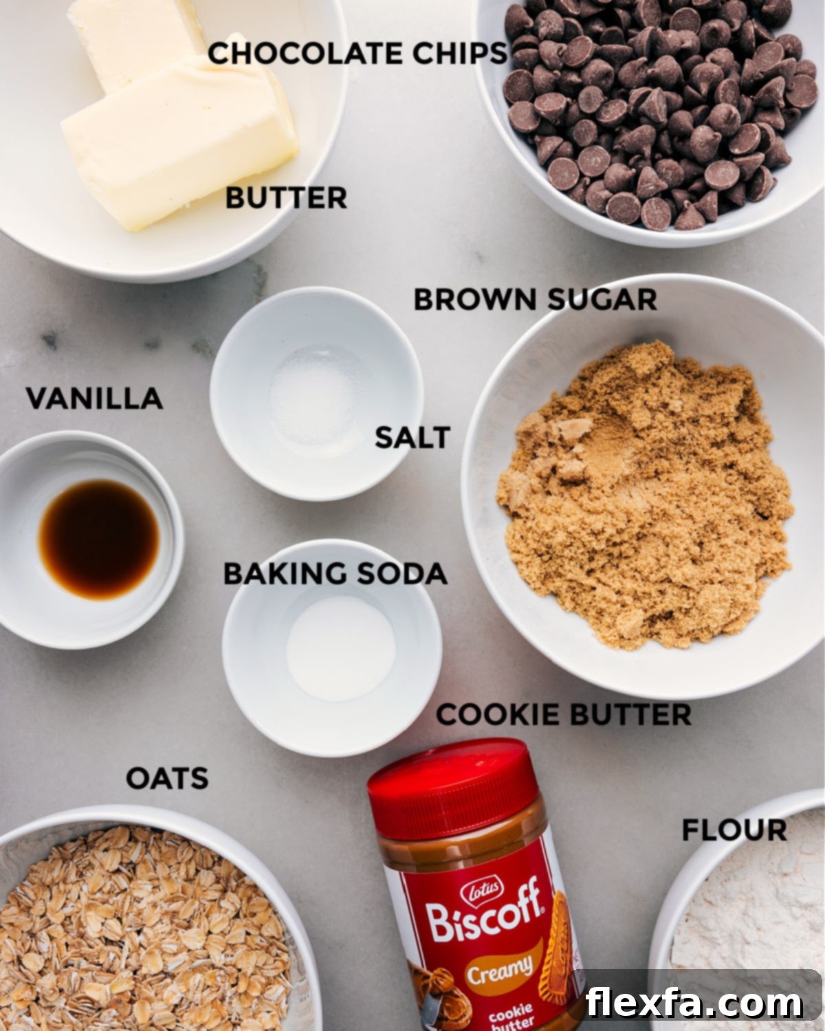 All essential ingredients for Cookie Butter Bars, prepped and arranged for easy assembly on a kitchen counter.