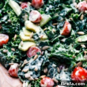 Mouth-watering kale salad with avocado, presented beautifully and ready for serving.