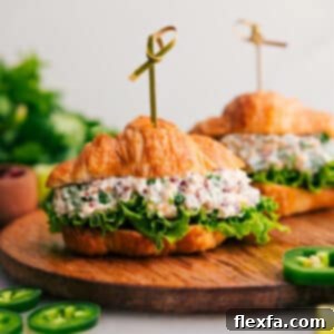 A serving of creamy Jalapeño Popper Chicken Salad in a bowl, garnished with cilantro, ready to be enjoyed.