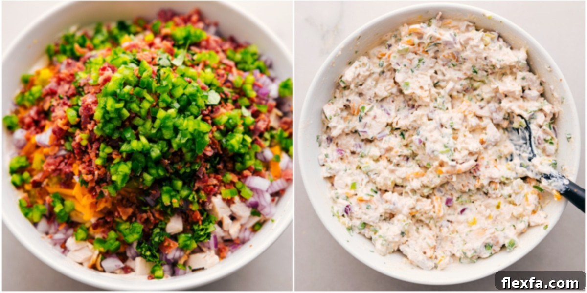 The vibrant and creamy Jalapeño Popper Chicken Salad, mixed perfectly in a large bowl and ready to be served, showcasing all its delicious ingredients.
