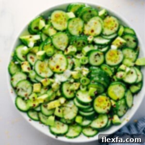 Asian Cucumber Salad in a bowl ready to be enjoyed.