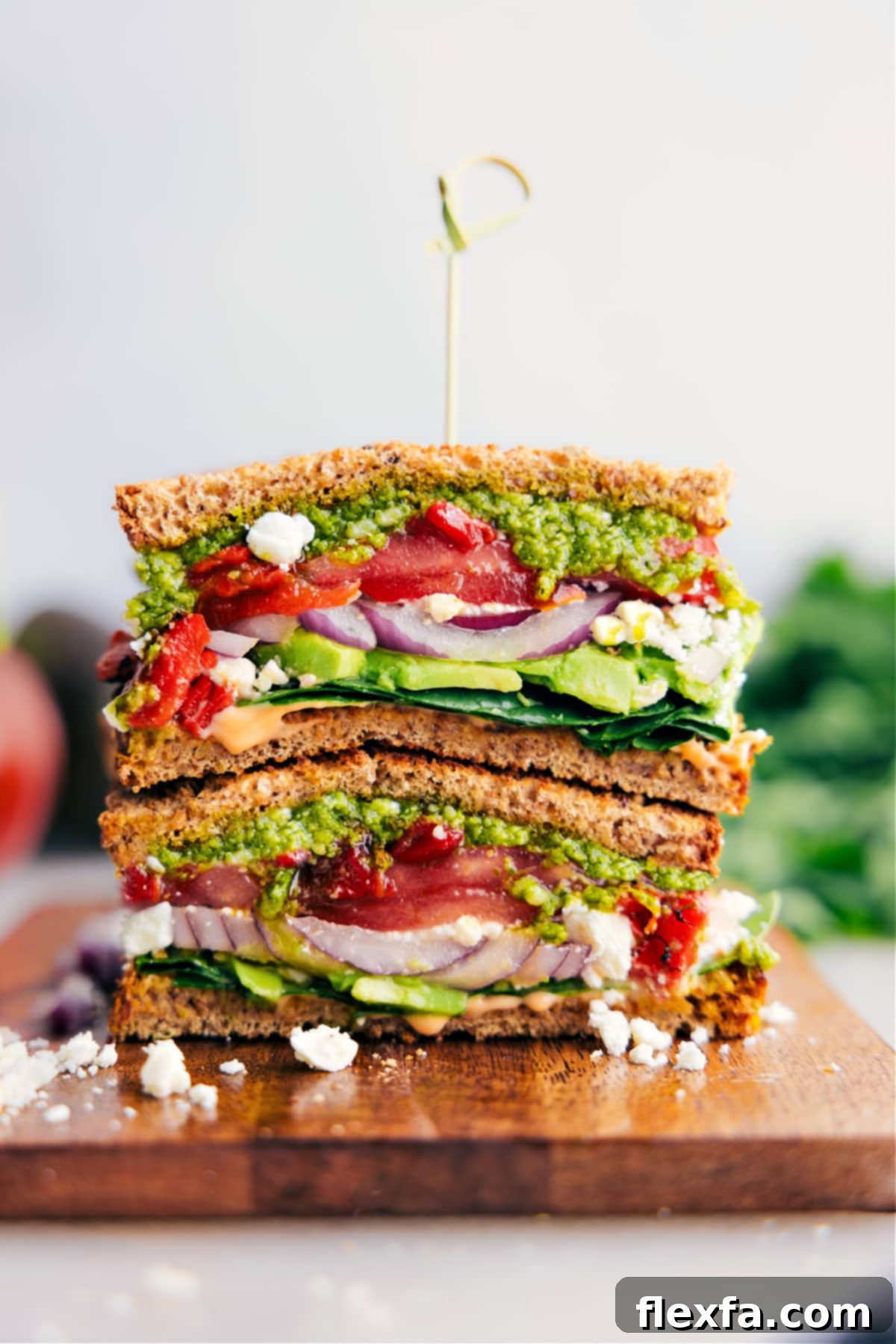 Easy, Vegetarian Mediterranean Sandwich Recipe Easy, vegetarian Mediterranean Sandwich—pile veggies, creamy feta cheese, and basil pesto on hearty bread.