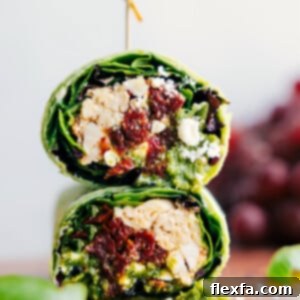 Mediterranean Wrap cut in half and stacked on top of each other.