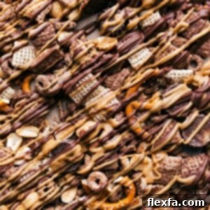 Finished chex mix chocolate peanut butter snack mix, packed with delicious ingredients, ready for enjoyment.