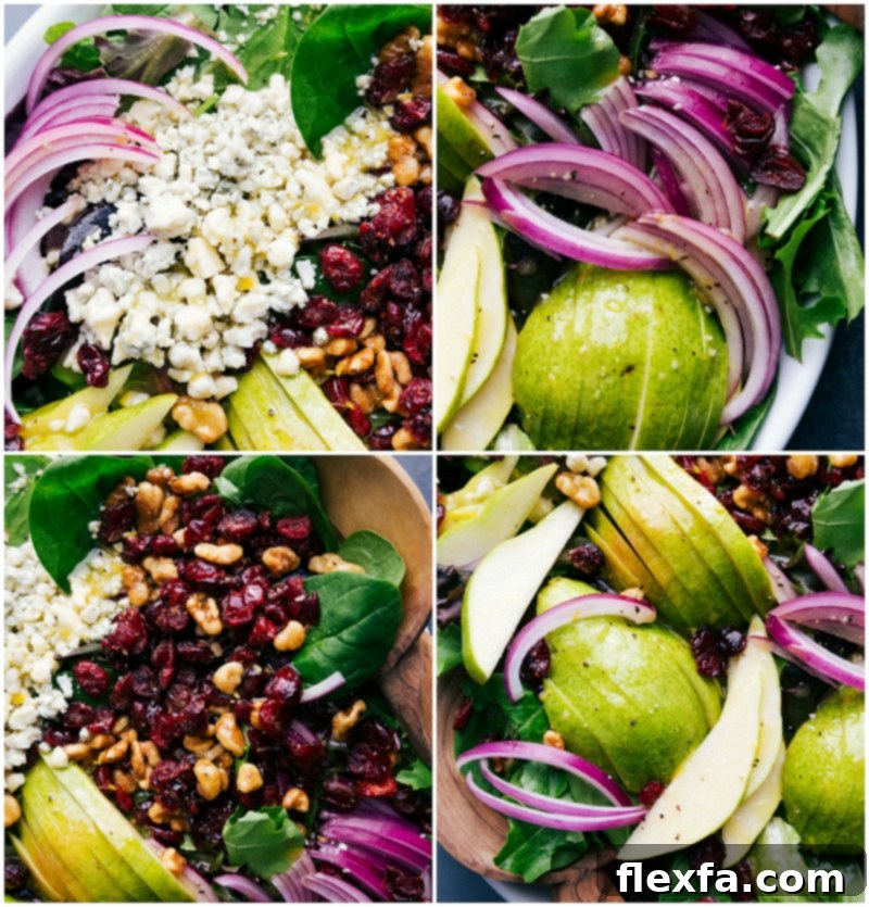 All the delicious components of the pear salad artfully arranged on a counter, showcasing fresh greens, sliced pears, candied walnuts, dried cranberries, red onion, and Gorgonzola cheese.