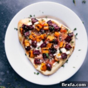 Finished Beet and Goat Cheese Flatbread on a serving board