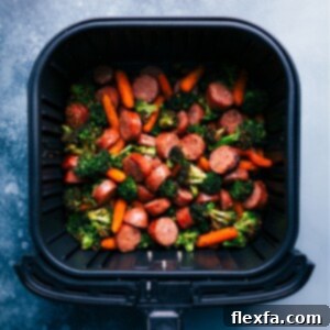 Honey Mustard Chicken Sausage and Veggies served with quinoa and greens