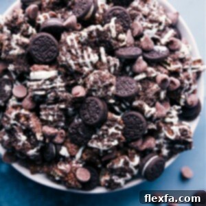 A bowl of finished Cookies and Cream Muddy Buddies ready to be served.