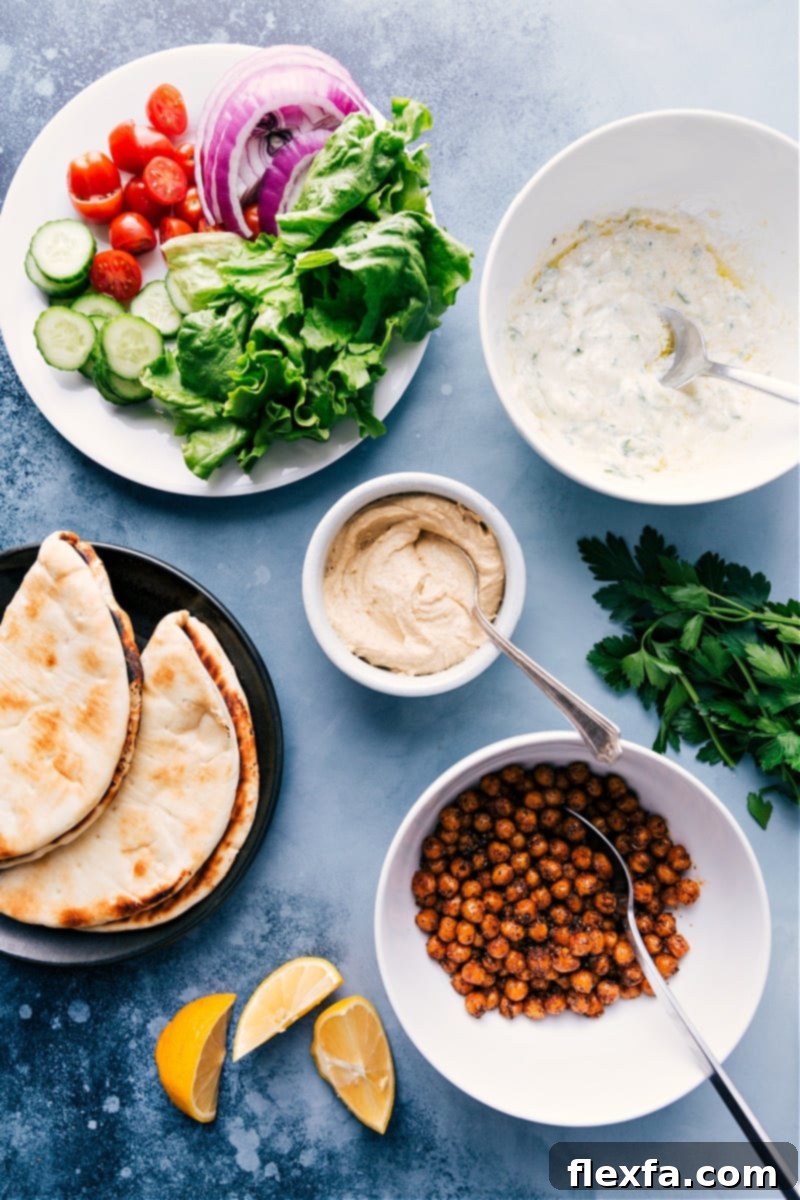 Overhead view of the fresh ingredients laid out on a countertop, ready for assembling Vegetarian Gyros.