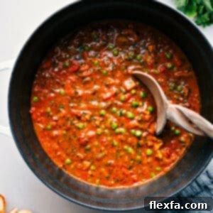 A vibrant bowl of homemade Vegetable Masala, rich and creamy, garnished with fresh cilantro, ready to be savored.