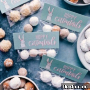 Close-up of fluffy Coconut Macaroons, some with chocolate drizzle, alongside delicate Mexican Wedding Cookies dusted with powdered sugar.