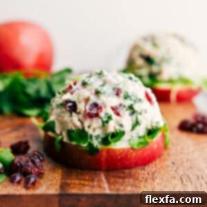 A close-up of the delicious Easy Tuna Salad with visible cranberries and herbs, ready to be served. Highlighting the creamy texture.