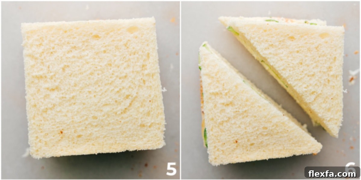 The process of carefully cutting the crusts off and then slicing the elegant cucumber sandwiches in half, ready for serving.