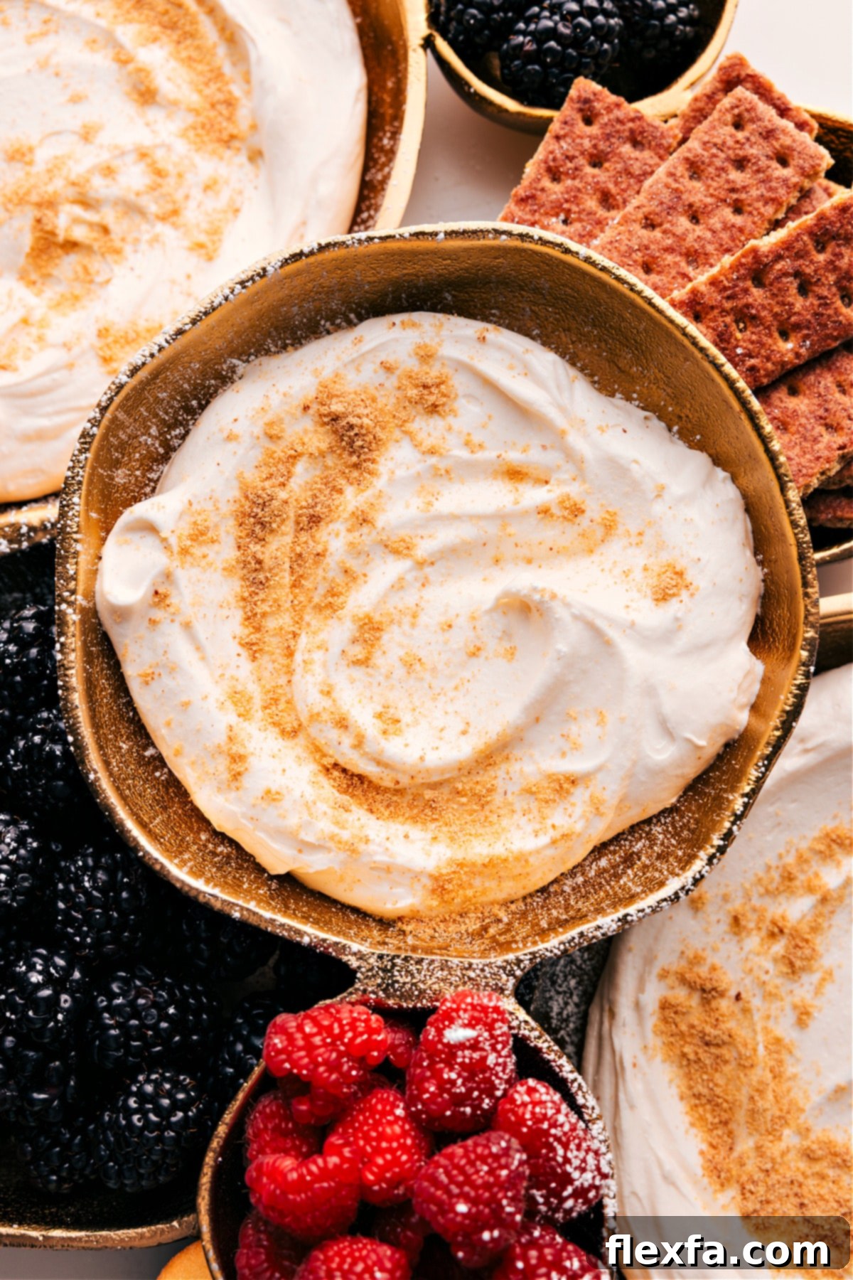 Cheesecake Dip with graham crackers and berries