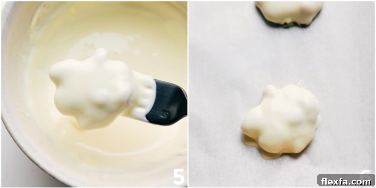 Polar Bear Paws being dipped in white chocolate.