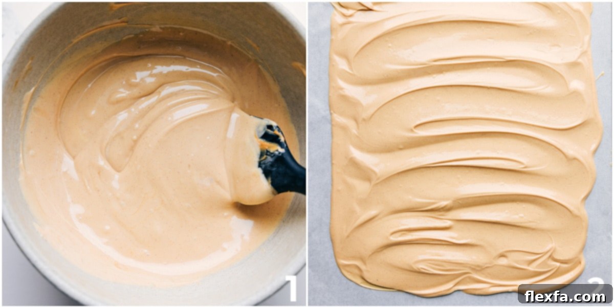 The peanut butter and white chocolate base for this peanut butter bark melted together and spread on a sheet pan.