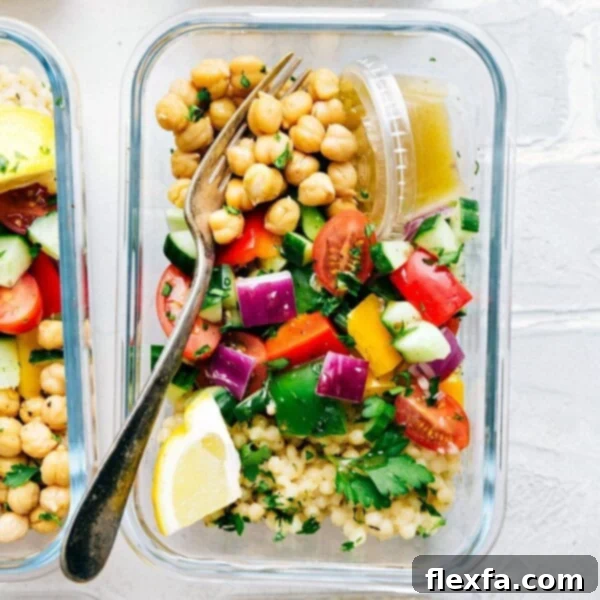 Greek couscous salad in a glass container for lunch.